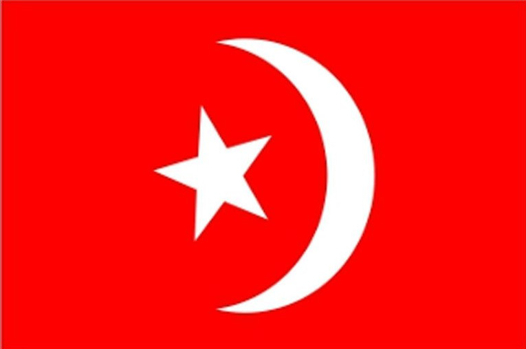 A white crescent moon and star on a red background, representing Islam.